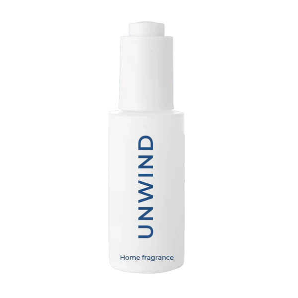 Optiphi Unwind Home Fragrance water-based diffuser fragrance with uplifting citrus and soothing floral notes to create a calming and restorative home atmosphere